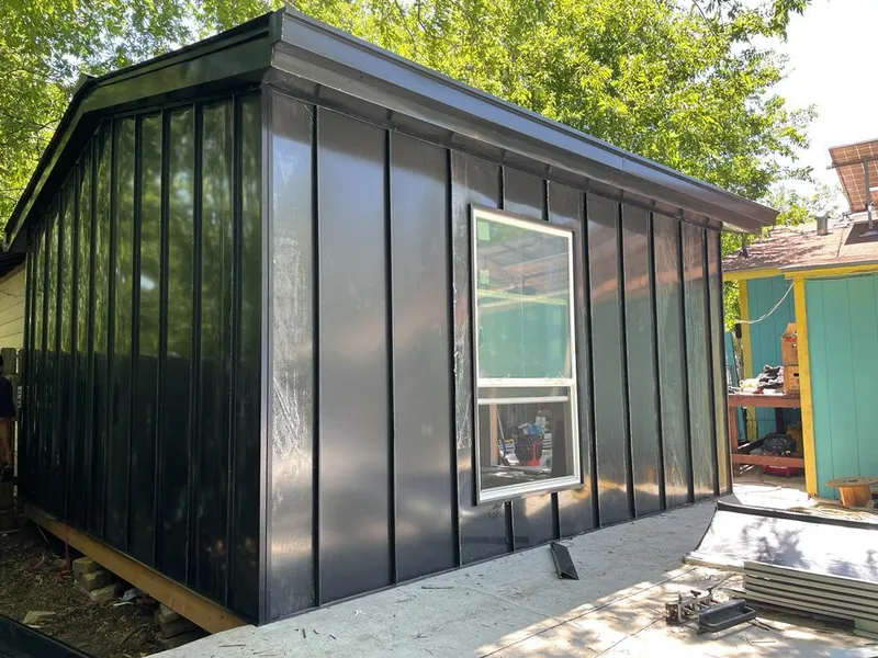 Black standing seam metal wall panels for Roof Inspection in James Island